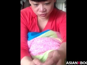 Asian babe gives nice handjob