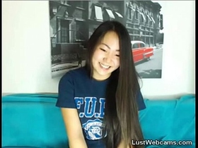 Cute Asian babe gets naked on webcam